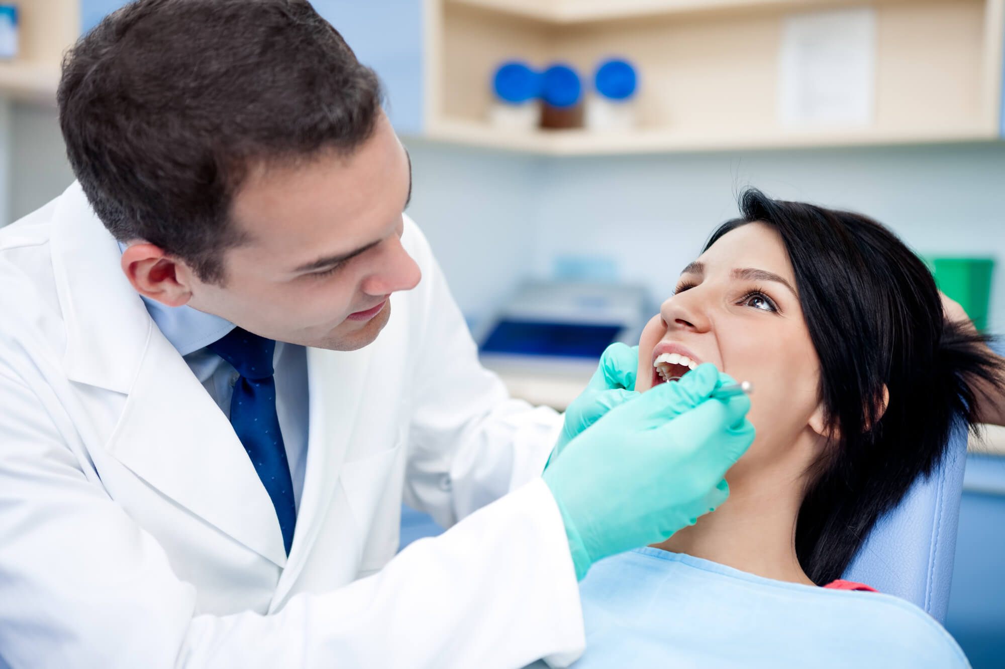 Doral Dentist examining patient's teeth