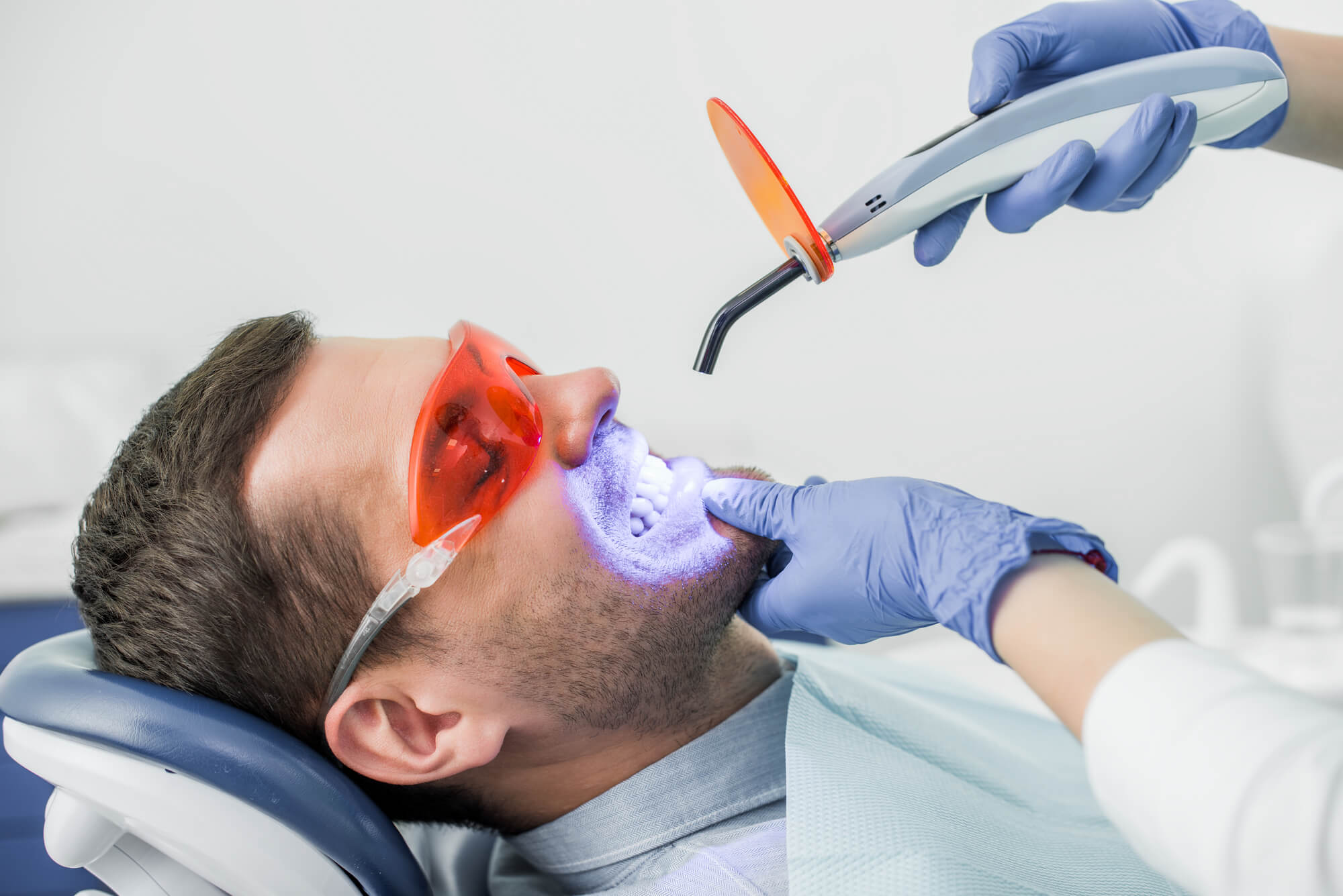 man getting professional Teeth Whitening in Tamiami
